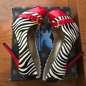 Zebra with red pumps size 6.5